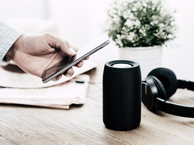 close-up of an arrangement with smartphone, headphones and loudspeaker 